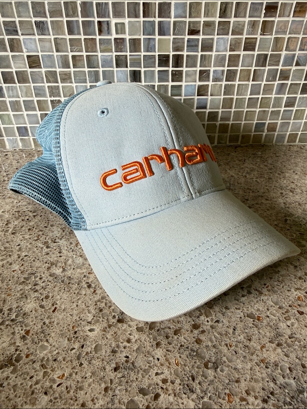 Carhartt Pale Blue Mesh Trucker Hat with Orange Embroidered Logo